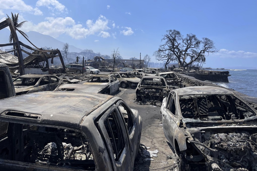 Burned-out cars sit after a wildfire raged through Lahaina, Hawaii, on August 9. Photo: Tiffany Kidder Winn via AP