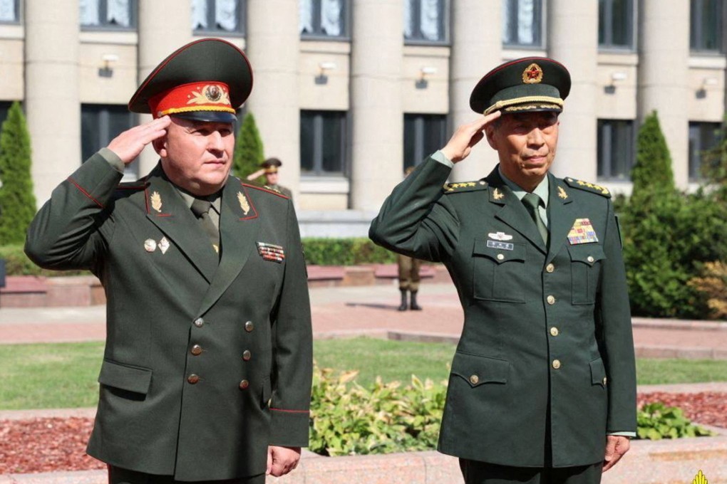 Belarusian defence minister Viktor Khrenin (left) and his Chinese counterpart General Li Shangfu in Minsk on Wednesday. Photo: Reuters