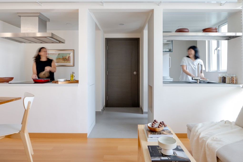 A couple’s meticulous reconfiguration of their apartment in Mei Foo Sun Chuen, Hong Kong, created a split kitchen (above), and wardrobes in lieu of walls, to maximise the use of its 499 square feet. Photo: Eugene Chan