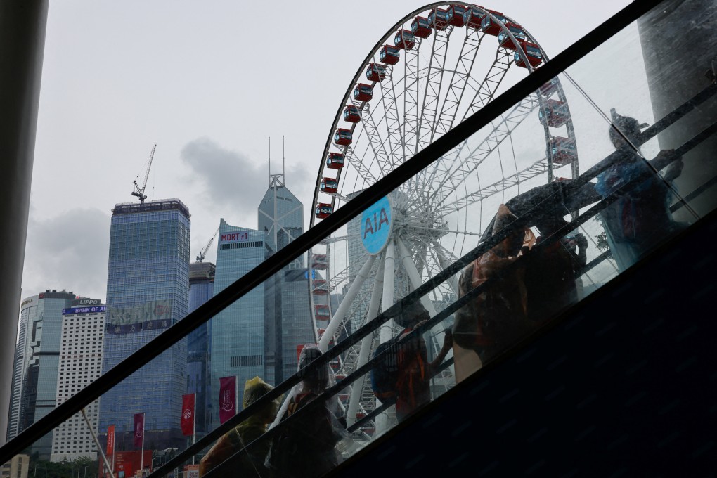 Tourists seen walking Central, Hong Kong’s financial district, on August 11, 2023. Photo: Reuters