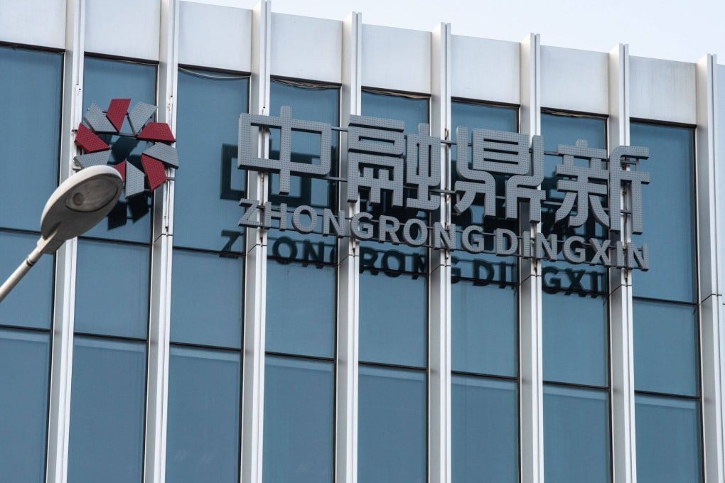 State-backed Zhongrong International Trust, one of China’s largest shadow banks, missed payments on more than 30 wealth management products. Photo: Bloomberg