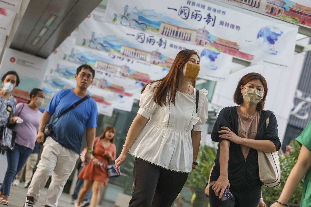 Civil servants leave the Central Government Offices in Tamar after work. Photo: May Tse