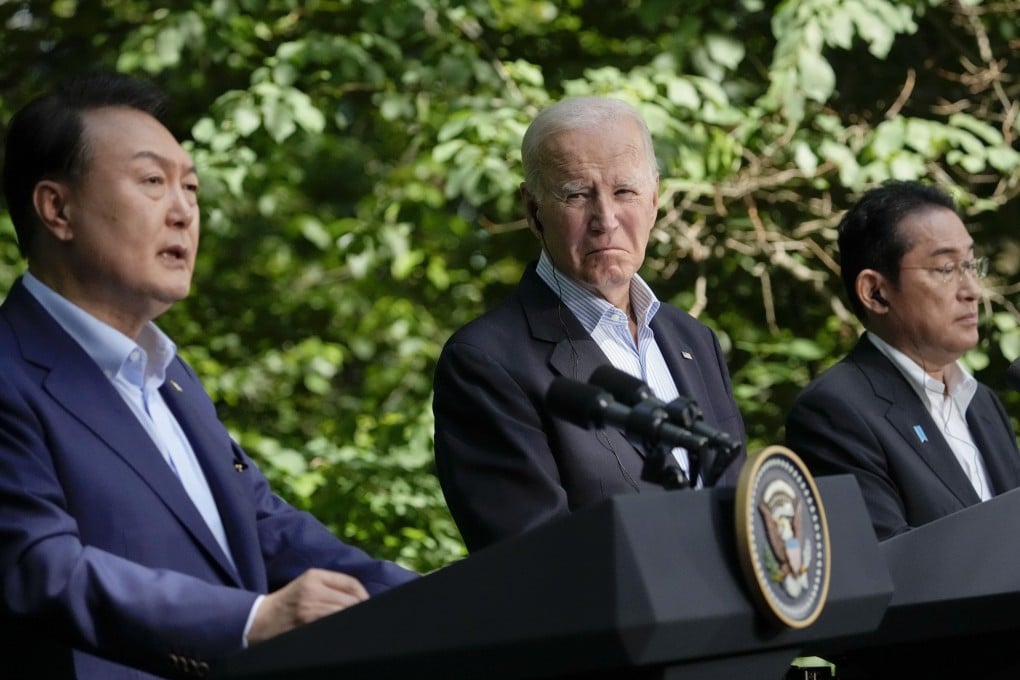 From left, South Korean President Yoon Suk-yeol, speaks during a joint news conference with US President Joe Biden and Japanese Prime Minister Fumio Kishida on Friday at Camp David. Photo: AP