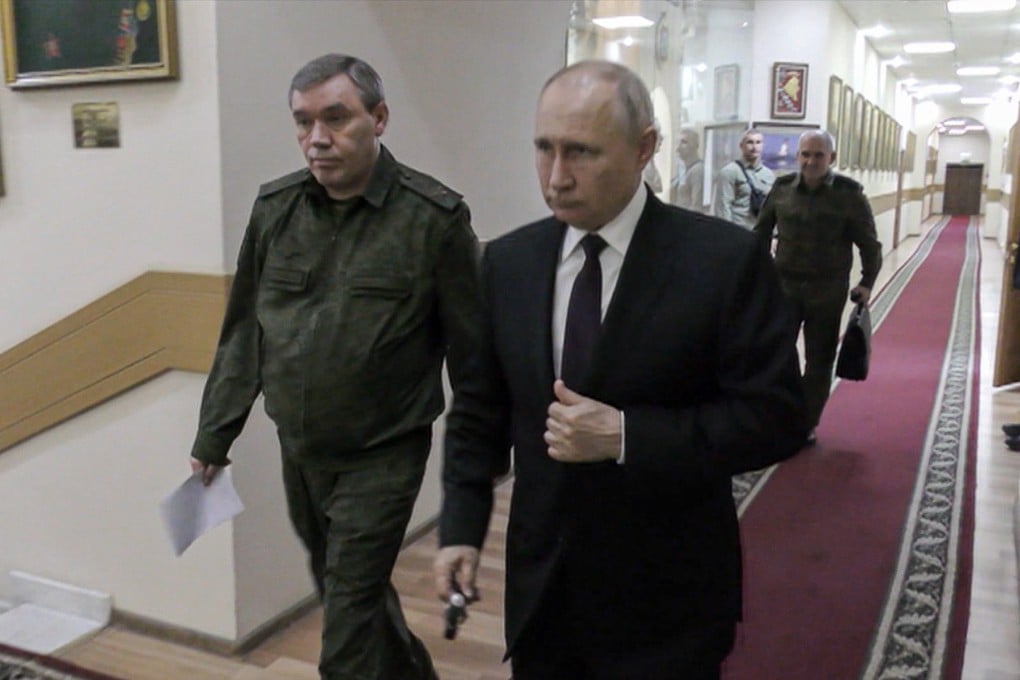 Russian President Vladimir Putin (right) and top general Valery Gerasimov at the military headquarters in Rostov-on-Don on Saturday. Photo: RU-RTR Russian Television via AP