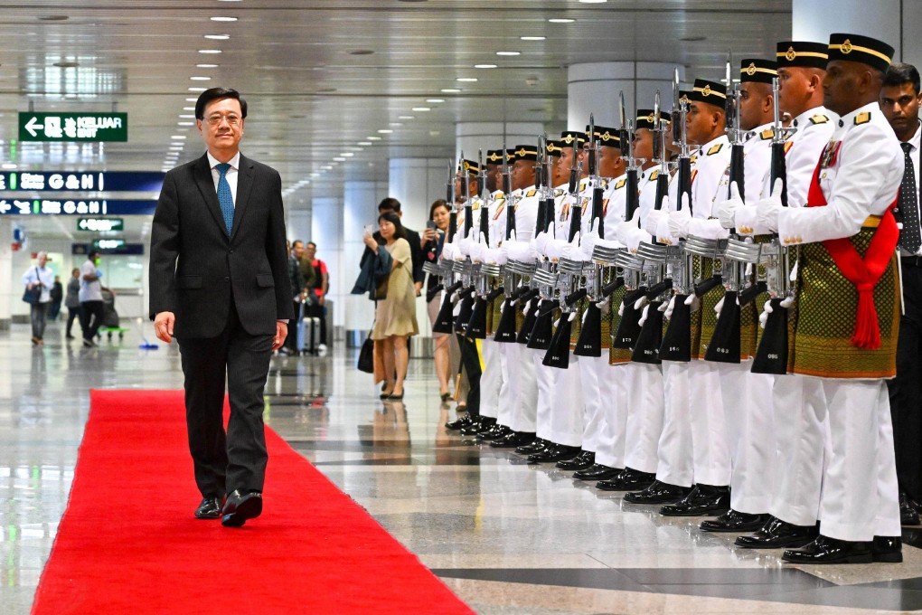 Chief Executive John Lee Ka-chiu receives a red carpet reception upon his arrival in Kuala Lumpur on July 27. Lee and his administration have made attracting global talent and promoting Hong Kong abroad high priorities, but many pressing concerns about life in the city remain unaddressed. Photo: Information Services Department handout