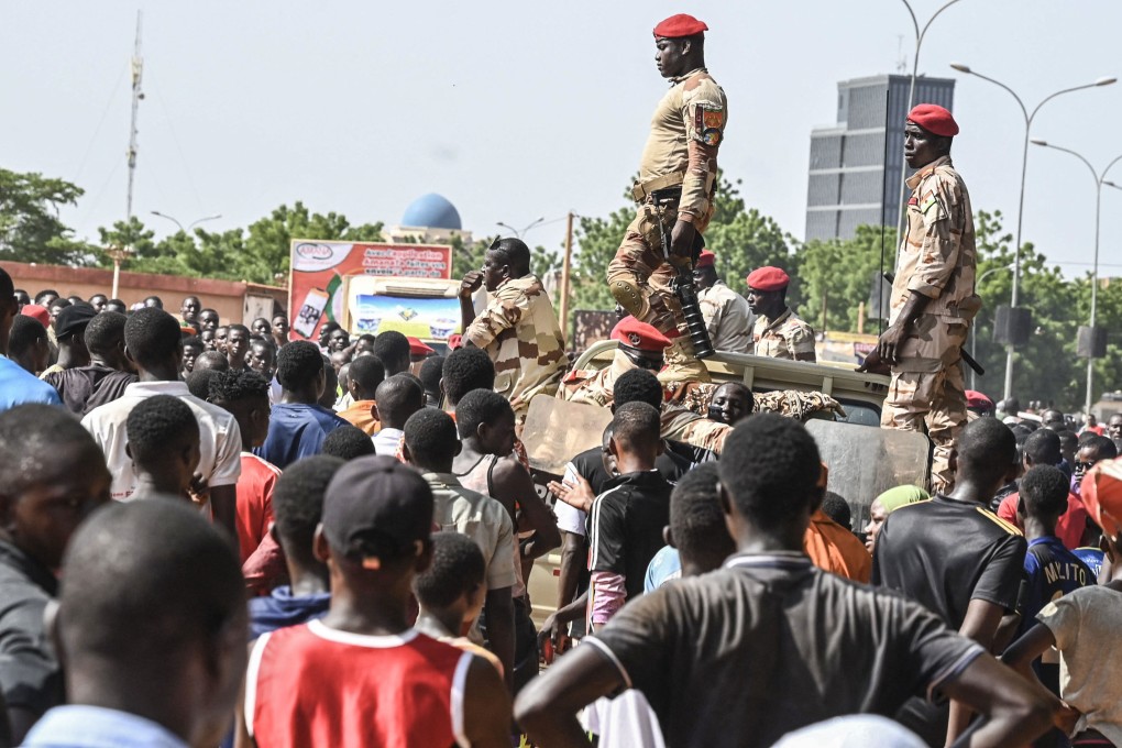 Volunteers gather near General Seyni Kountche Stadium in Niamey on August 19 responding to the call from several organisations to be registered as civilian auxiliaries to potentially mobilise in support of the armed forces. Photo: AFP