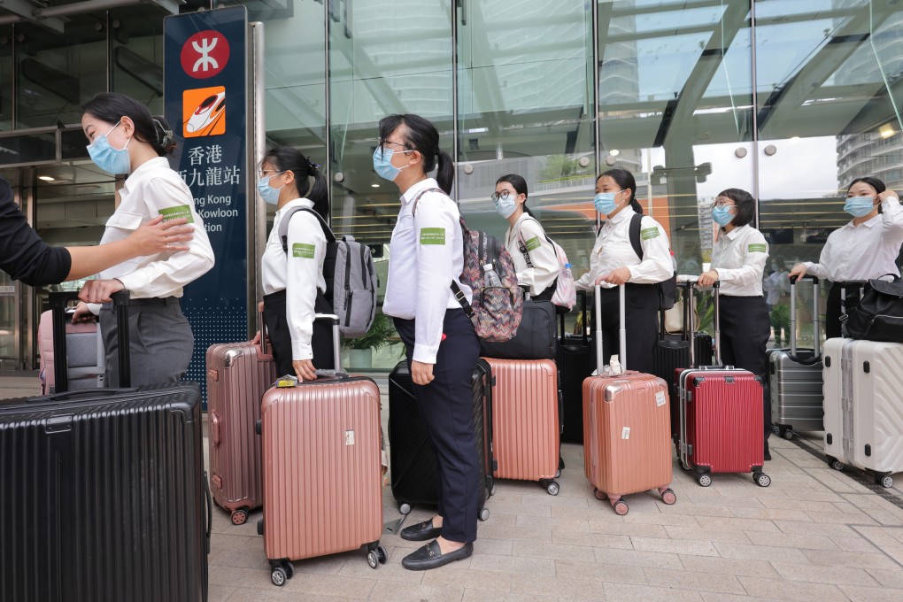 Participants in the Greater Bay Area Healthcare Talents Visiting Programme arrive at West Kowloon Station on April 17. Persistent concerns about Hong Kong’s press freedom, judicial independence, cost of living and the national security law have held back efforts to draw urgently needed talent from places other than the mainland. Photo: Jelly Tse