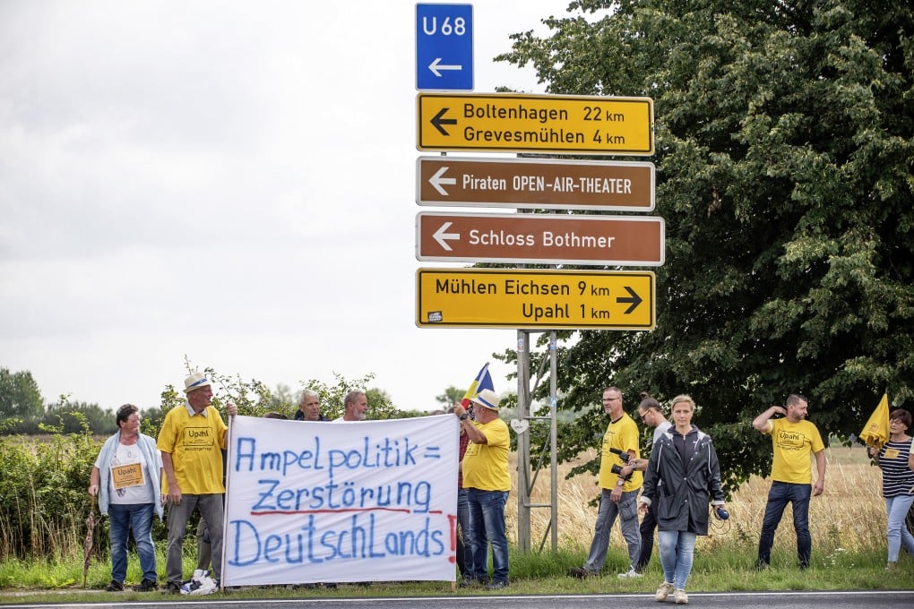People gather for a protest march against the construction of a refugee shelter in Upahl, Germany, on July 29. The anti-immigrant sentiment in Germany is a marked change from 2016, when the country welcomed more than a million refugees fleeing the war in Syria and other conflicts. Photo: DPA