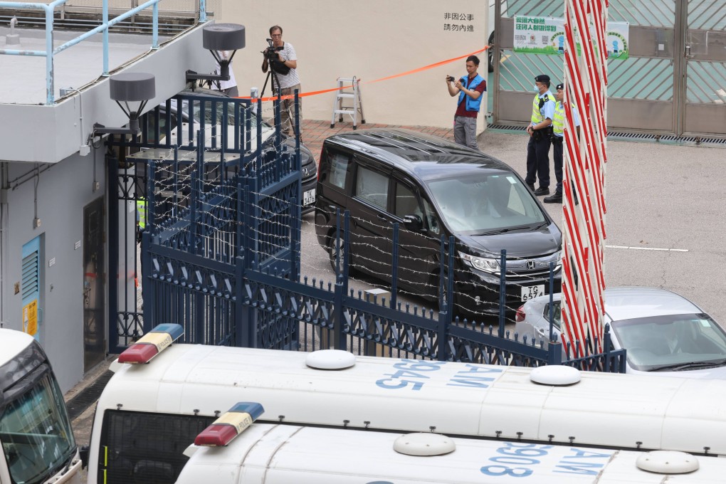 A police vehicle carrying Tang Kai-yin arrives at Tin Shui Wai Police Station. Tang is expected to appear in court on Wednesday. Photo: Yik Yeung-man