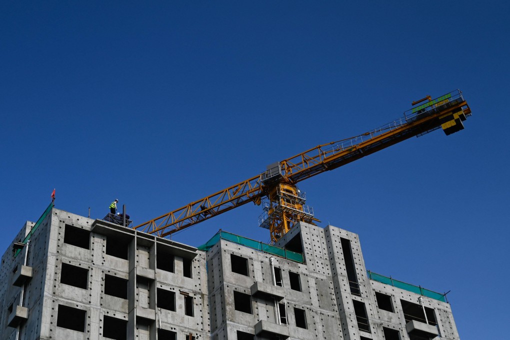 The decision not to make bigger cuts surprised investors, with some worried that it could spark a slew of defaults in China’s crisis-ridden property sector. Photo: AFP