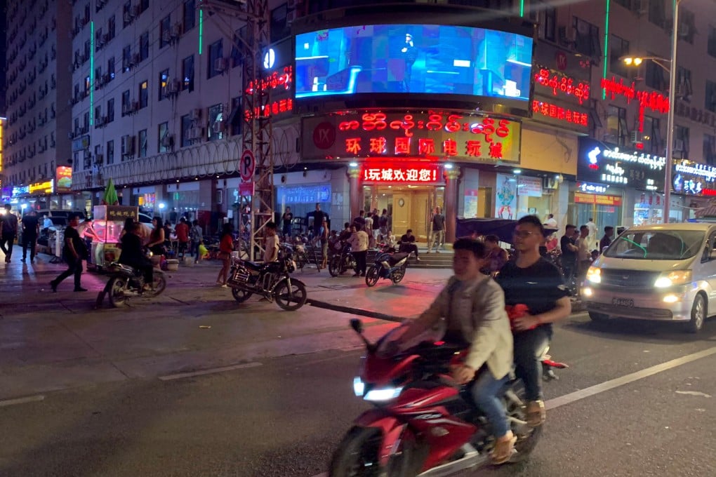 A street scene from a city on the Myanmar-China border known as a sex, drugs and gambling hub. Senior Chinese officials have in recent months urged Myanmar to do more to eradicate groups running cyber scams from the country. Photo: AFP