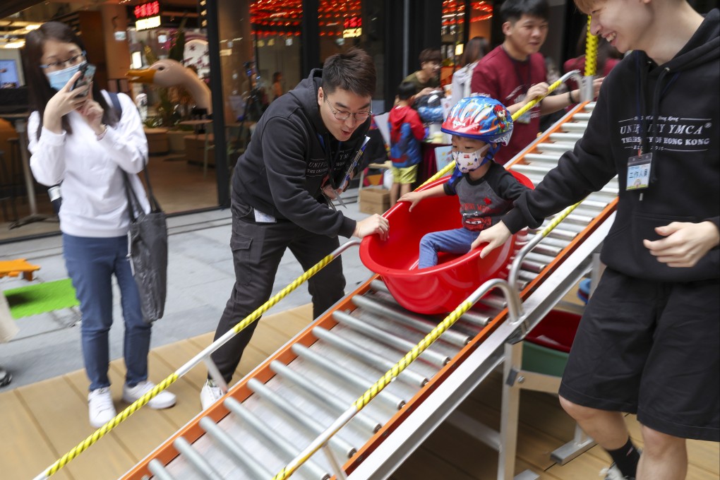Children play at a carnival at Central Market on March 19. Child safeguarding includes developing policies, guidelines and standards that support safe interactions with, and safe environments for, children. Photo: Yik Yeung-man