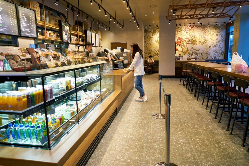 A customer at a coffee shop in Seoul. Photo: Shutterstock