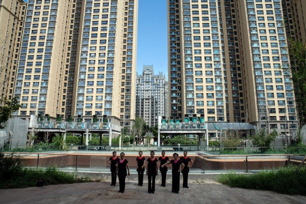 Residential buildings developed by China Evergrande Group in Beijing. The developer had land reserves of 190 million square metres, as of June, according to exchange filings. Photo: Bloomberg