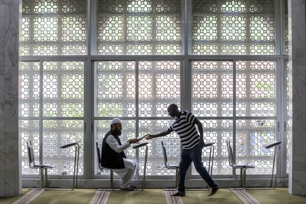 Chief imam Mufti Muhammad Arshad (left) at Kowloon Mosque in Tsim Sha Tsui. Photo: Jonathan Wong