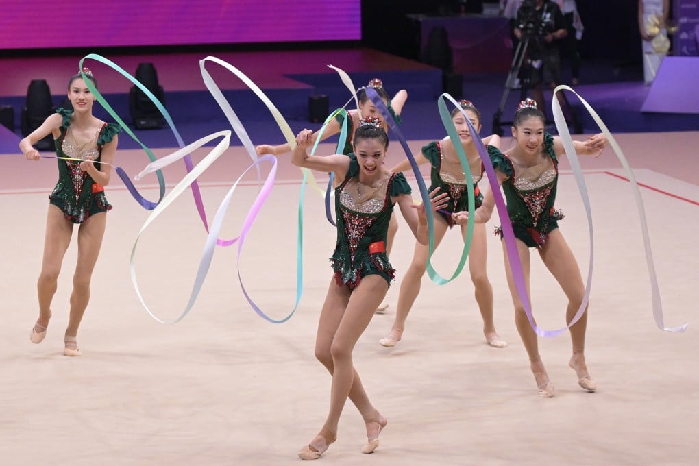China had their coaches jumping for joy with their routine in the Ribbons and Balls at the Rhythmic Gymnastics World Championships in Valencia. Photos: Twitter/International Gymnastics Federation (@gymnastics)