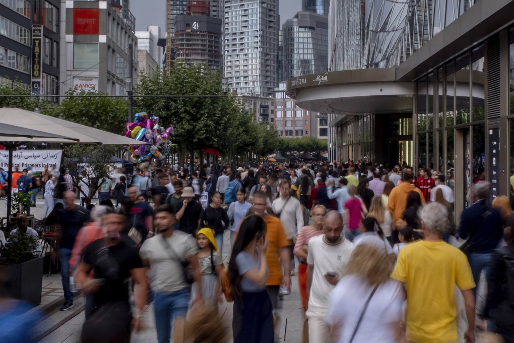 People walk in the main shopping street in central Frankfurt, Germany. The country is in need of skilled workers, but is having a hard time retaining temporary migrants to fill positions. Photo: AP