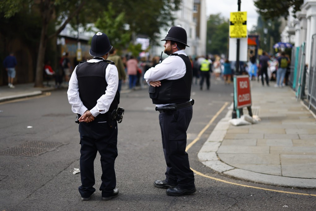 Two members of London’s Metropolitan Police in London, Britain on Sunday. Photo: EPA-EFE