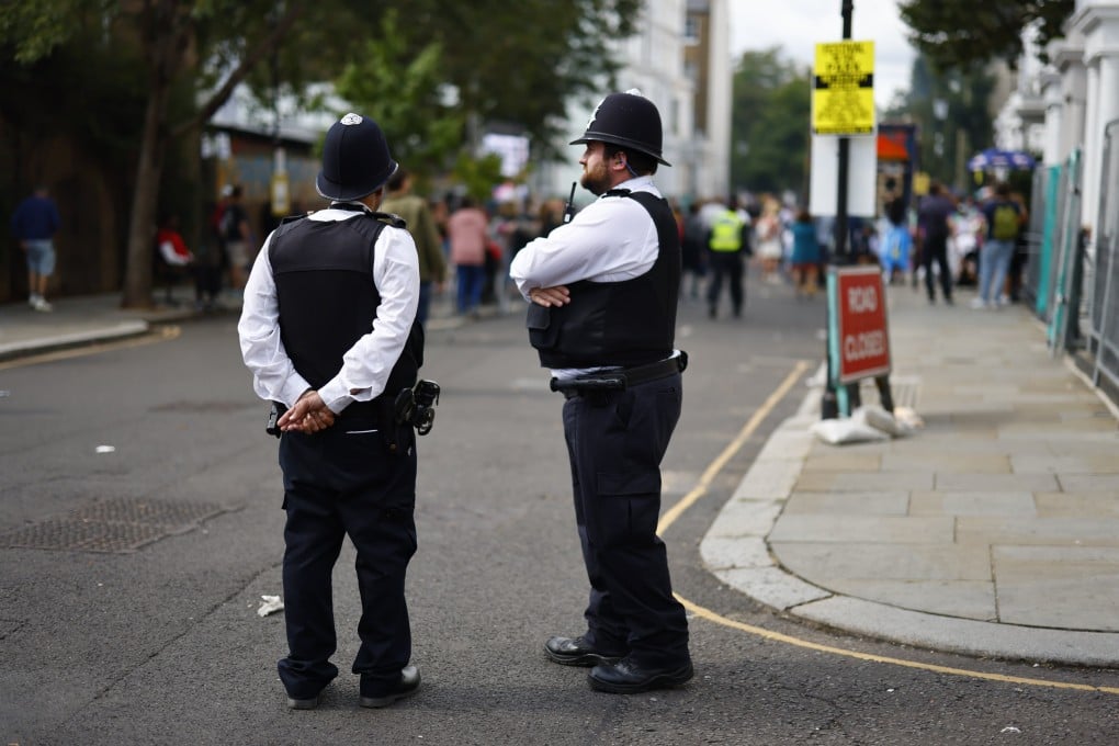Two members of London’s Metropolitan Police in London, Britain on Sunday. Photo: EPA-EFE