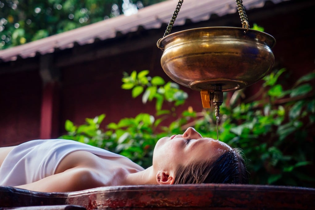 Indian state Kerala is popular for its tropical climate and beaches, and backwater boat trips. Now it hopes its to benefit from the country’s new Ayush visa that makes it easier to visit for Ayurvedic treatments (above) and other wellness pursuits. Photo: Shutterstock Images