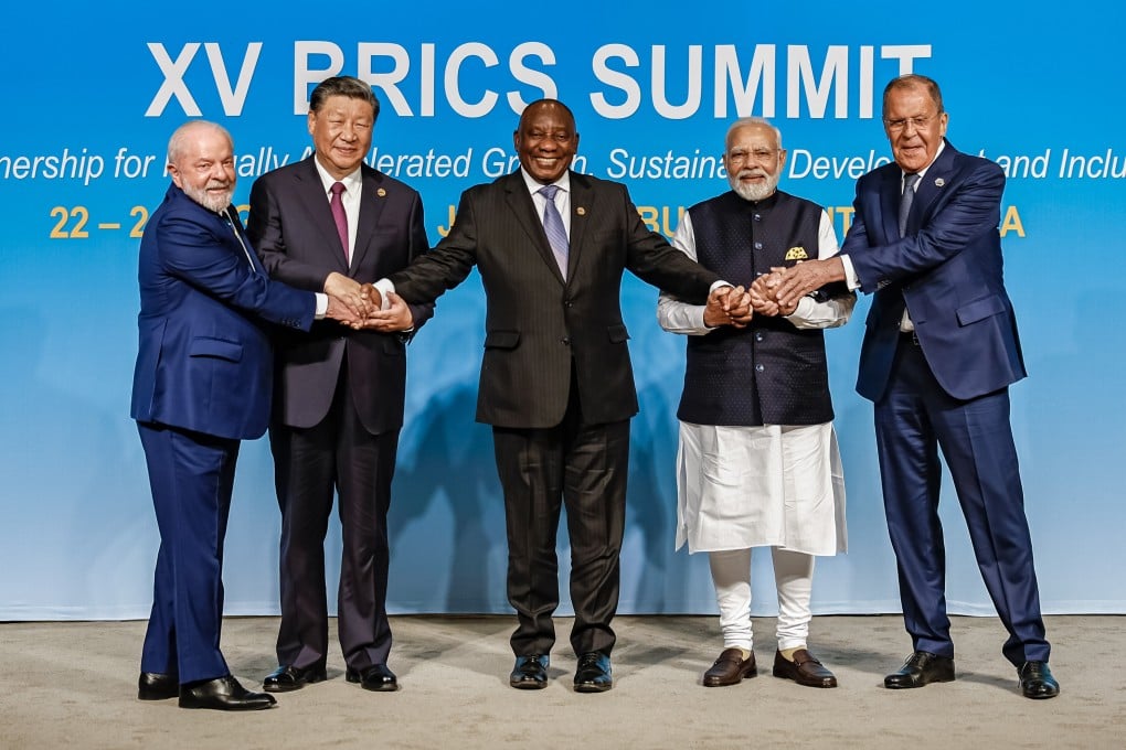 (From left) Brazil’s President Luiz Inacio Lula da Silva, China’s President Xi Jinping, South African President Cyril Ramaphosa, Indian Prime Minister Narendra Modi and Russia’s Foreign Minister Sergei Lavrov at the BRICS Summit in Johannesburg on August 23. Photo: dpa