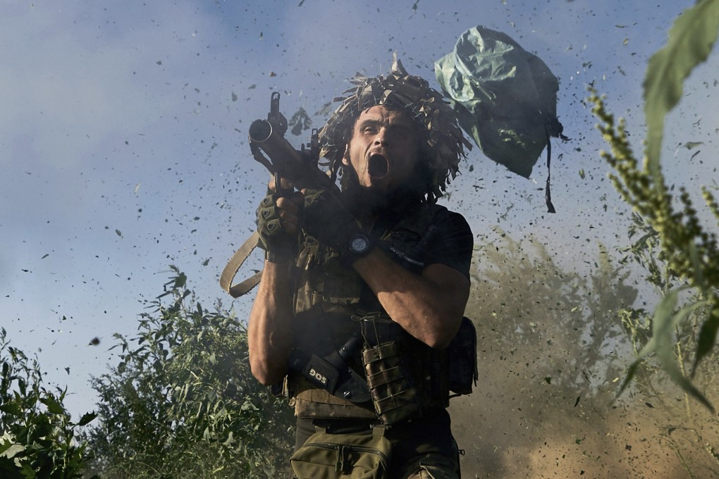 A Ukrainian serviceman fires a RPG-9 towards Russian positions at the front line close to Donetsk, Ukraine. Photo: AP
