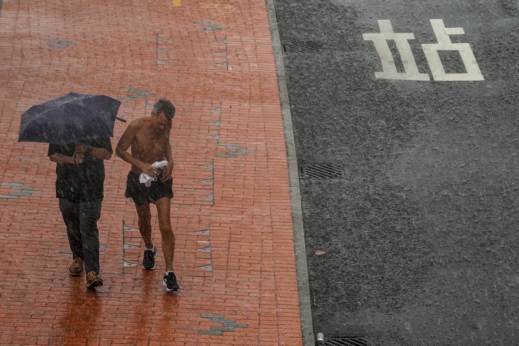 Hong Kong has been lashed by heavy rain. The Observatory has said the movement of Saola remains unpredictable. Photo: Elson Li