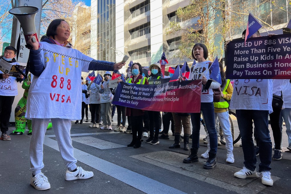 Chinese migrants in Australia protest against a policy on investment visa in Sydney on June 16, 2023. Photo: Reuters