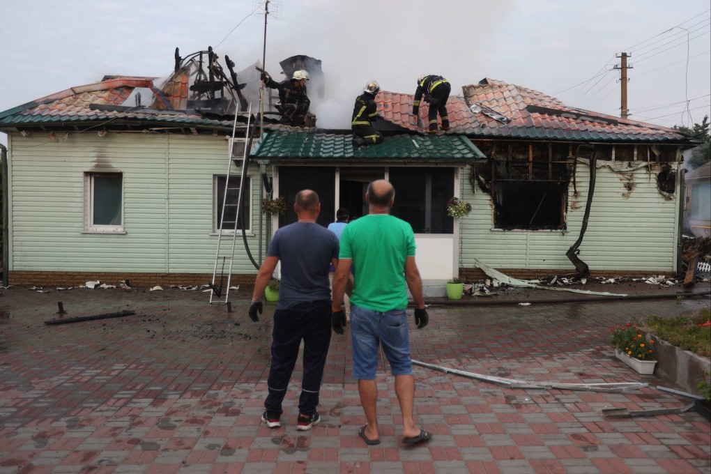 A house that was damaged following a missile attack in a village outside Kyiv, Ukraine. Photo: AFP