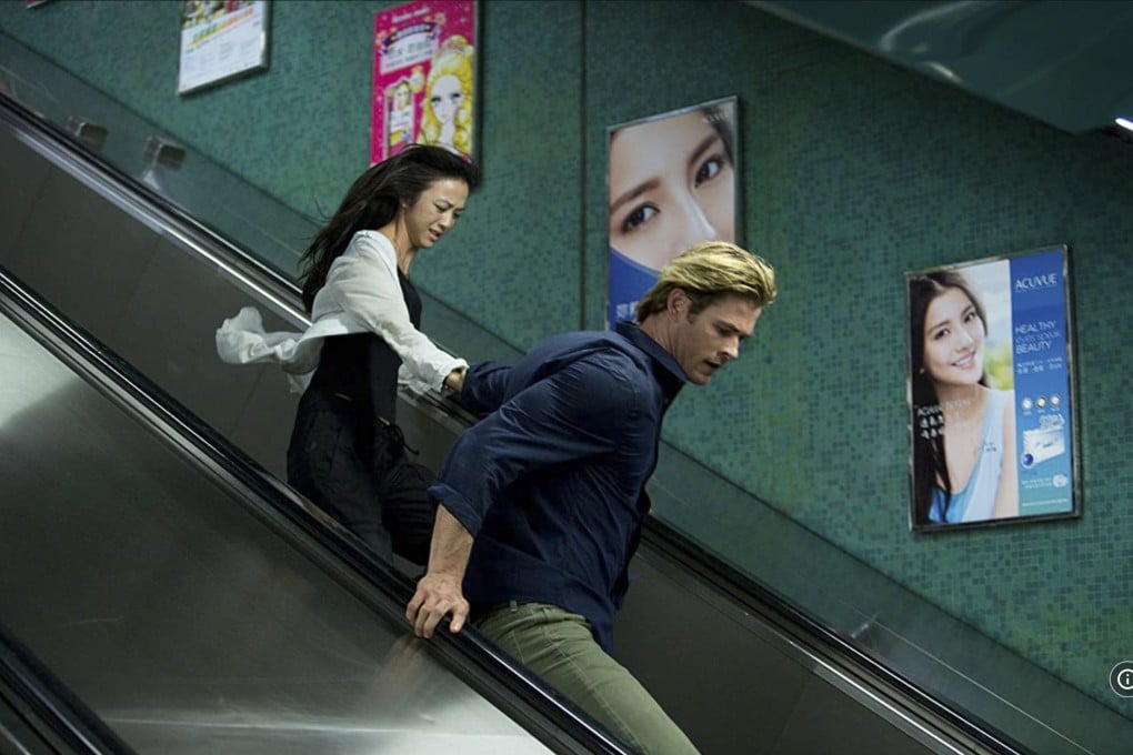 Tang Wei and Chris Hemsworth ride an escalator in a station on Hong Kong MTR subway network in a still from “Blackhat” (2015). Michael Mann’s 2015 film had plenty of expertly filmed action set pieces, but little else going for it. Photo: Universal Pictures