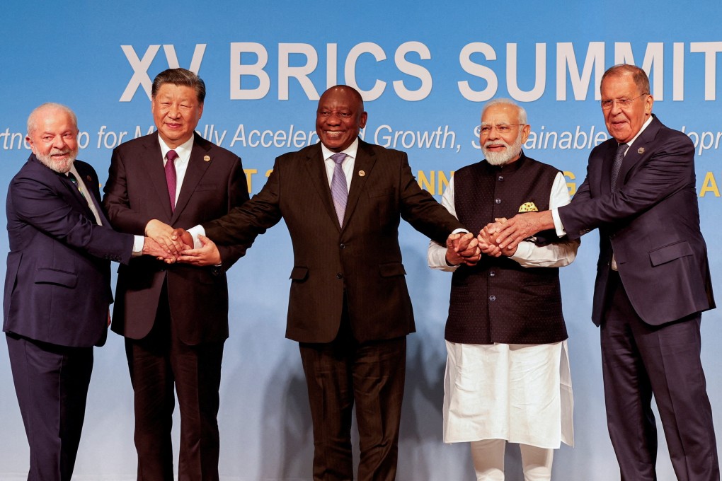 Brazil’s President Luiz Inacio Lula da Silva, China’s President Xi Jinping, South Africa’s President Cyril Ramaphosa, India’s Prime Minister Narendra Modi and Russia’s Foreign Minister Sergei Lavrov pose for a Brics family photo during the Brics Summit in Johannesburg on August 23. Photo: Reuters