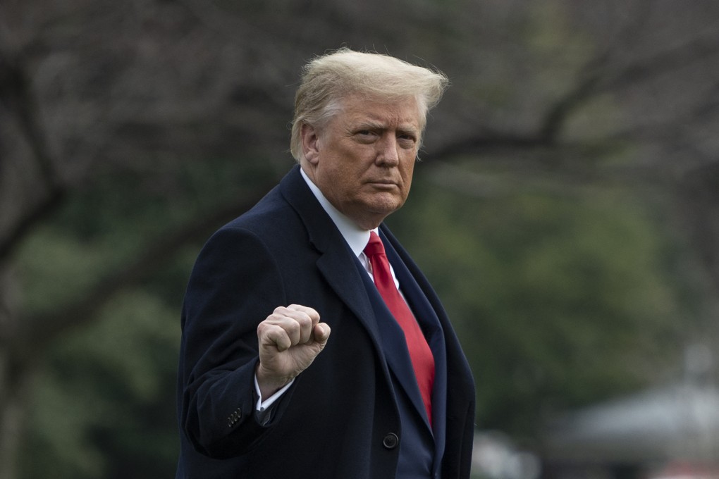 US President Donald Trump leaves the White House in December 2020. Photo: AFP