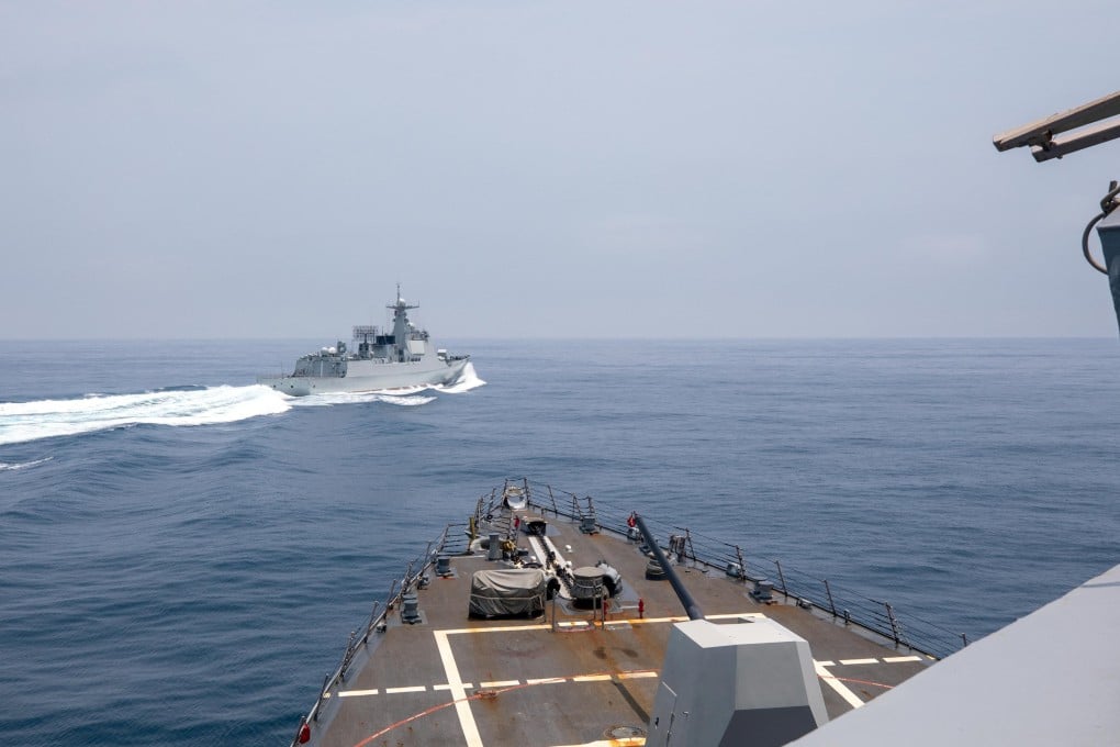 The Chinese warship Luyang III sails near the USS Chung-Hoon, as seen from the deck of a US destroyer in the Taiwan Strait on June 3. A Pentagon official has discussed a plan to increase use of drones and other “attritable autonomous systems” in countering China. Photo: US Navy via Reuters