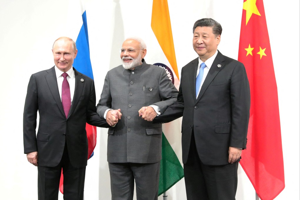 Russian President Vladimir Putin, Indian Prime Minister Narendra Modi and Chinese leader Xi Jinping meet on the sidelines of the G20 summit in Japan in 2019. Photo: Reuters