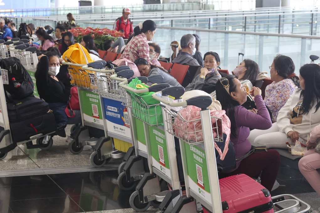 Stranded passengers at Hong Kong’s airport since Friday wait for flights to resume. Photo: Edmond So