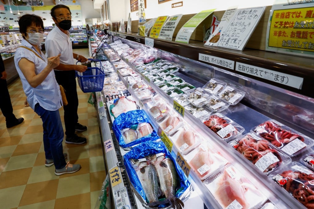 Shoppers browse locally caught seafood in Soma, Fukushima prefecture, Japan, on Thursday. There have been protests over Japan’s decision to release waste water from the Fukushima nuclear plant into the Pacific Ocean despite tests and testimony suggesting it is no more radioactive than many naturally occurring substances. Photo: Reuters