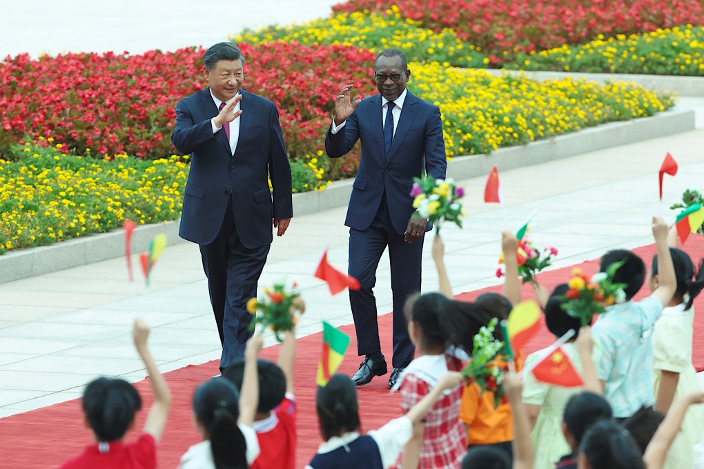 Chinese President Xi Jinping welcomes Beninese President Patrice Talon to Beijing on Friday. Photo: Reuters