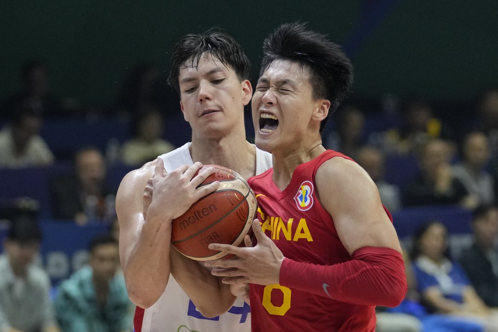 China guard Zhao Rui (right) vies for the ball with Philippines counterpart Dwight Ramos on Saturday. Photo: AP