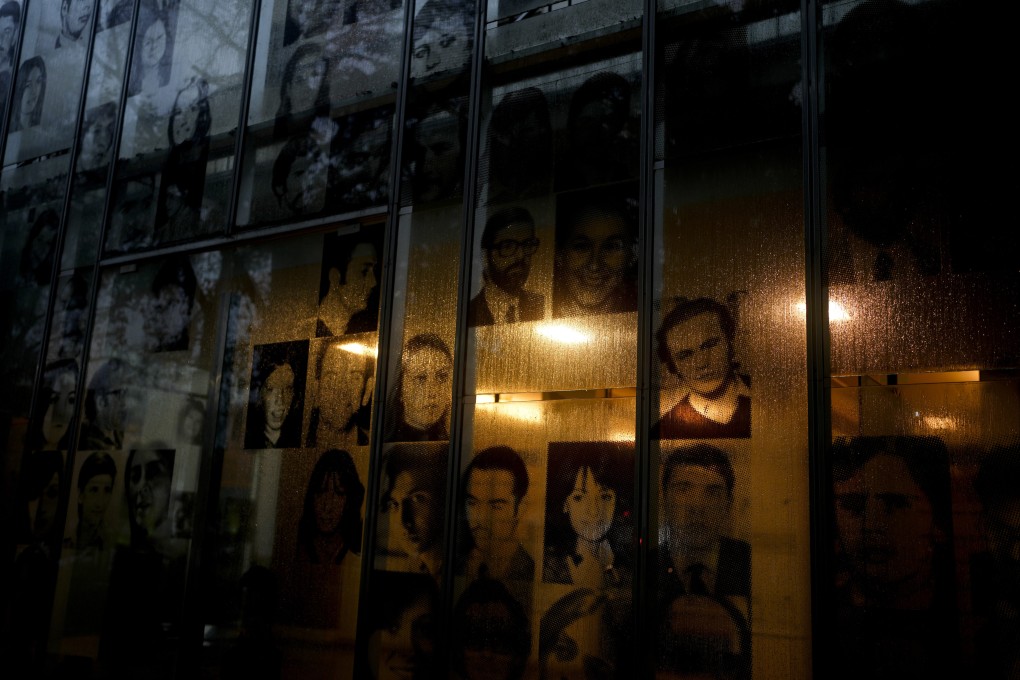 Photographs of people who disappeared during Argentina’s dictatorship at the Human Rights Museum, in Buenos Aires. Photo: AP