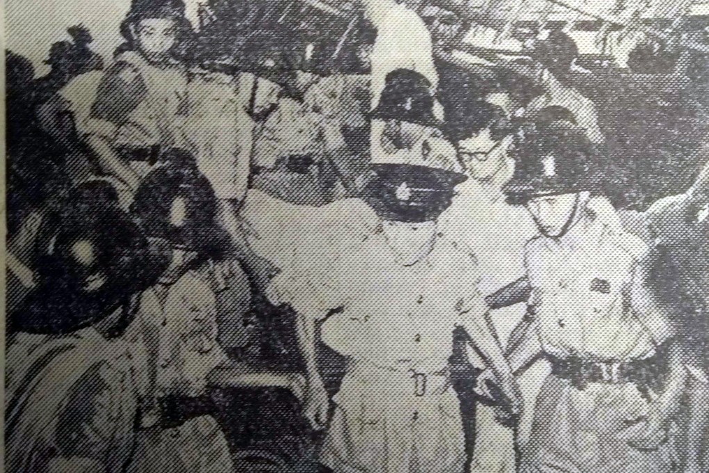 Police and firemen rescue workers trapped under the rubble of an apartment block under construction in Kowloon, Hong Kong, which collapsed suddenly in 1953, trapping them. Six were killed. Photo: SCMP