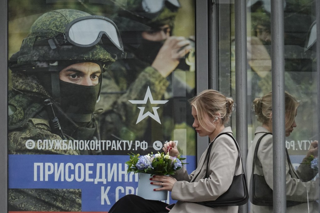 A Russian military poster at a bus stop in Moscow. Photo: EPA-EFE