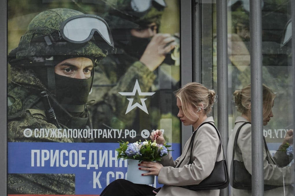 A Russian military poster at a bus stop in Moscow. Photo: EPA-EFE