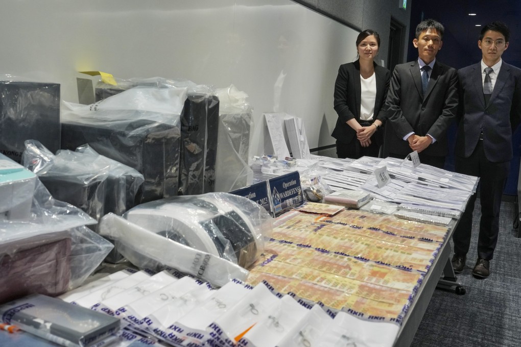 (Left to right) Inspector Christine Leung, Chief Inspector Lau Ho-tak and Senior Inspector Tuen Yuk-han display some of the evidence gathered. Photo: Elson Li