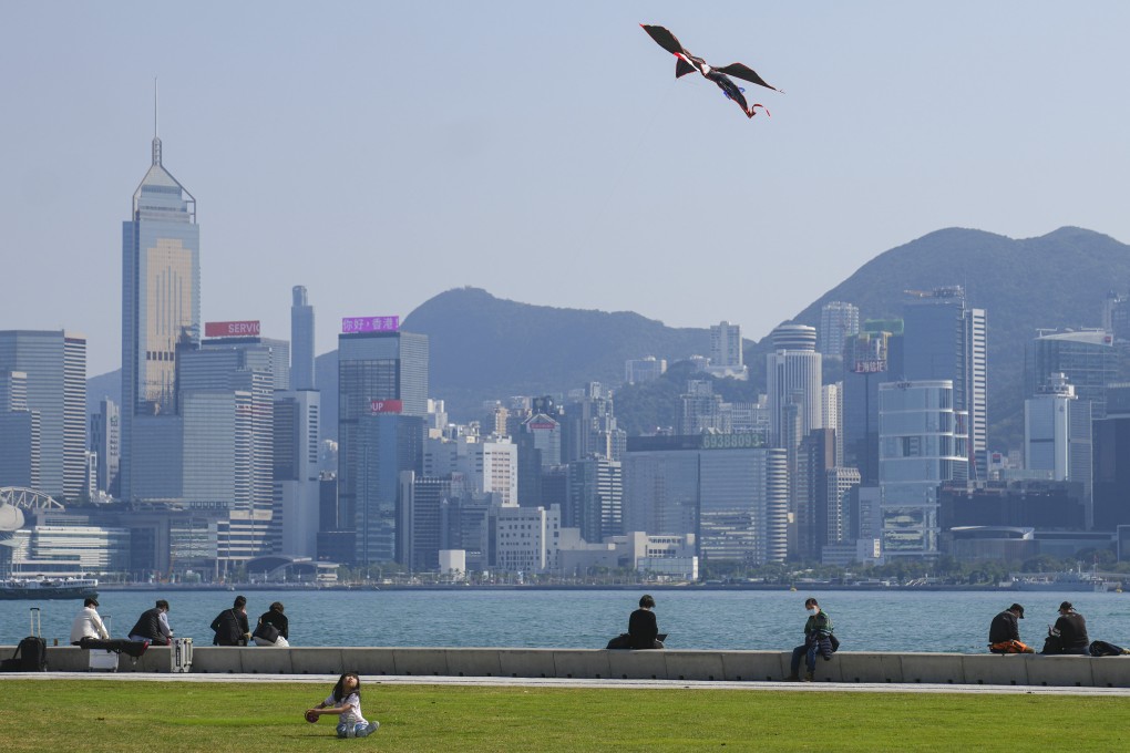 A girl flies a kite at the waterfront of West Kowloon Cultural District on February 15, 2023. Photo: Sam Tsang
