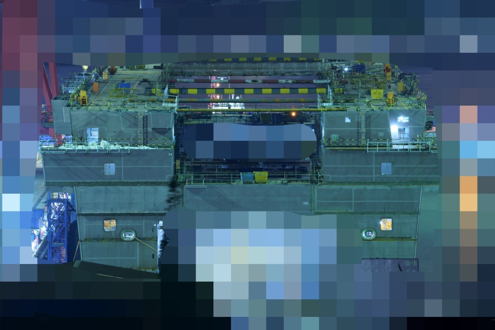 Imagery posted on social media of the PLA’s fourth Type 075 amphibious helicopter assault ships in dry dock shows its deck uncapped, despite the hull being nearly completed. Photo: Weibo