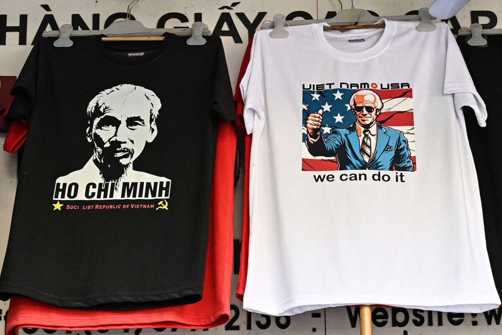 A shop in Hanoi selling T-shirts bearing the images of the late Vietnamese leader Ho Chi Minh and US President Joe Biden on Wednesday. Photo: AFP