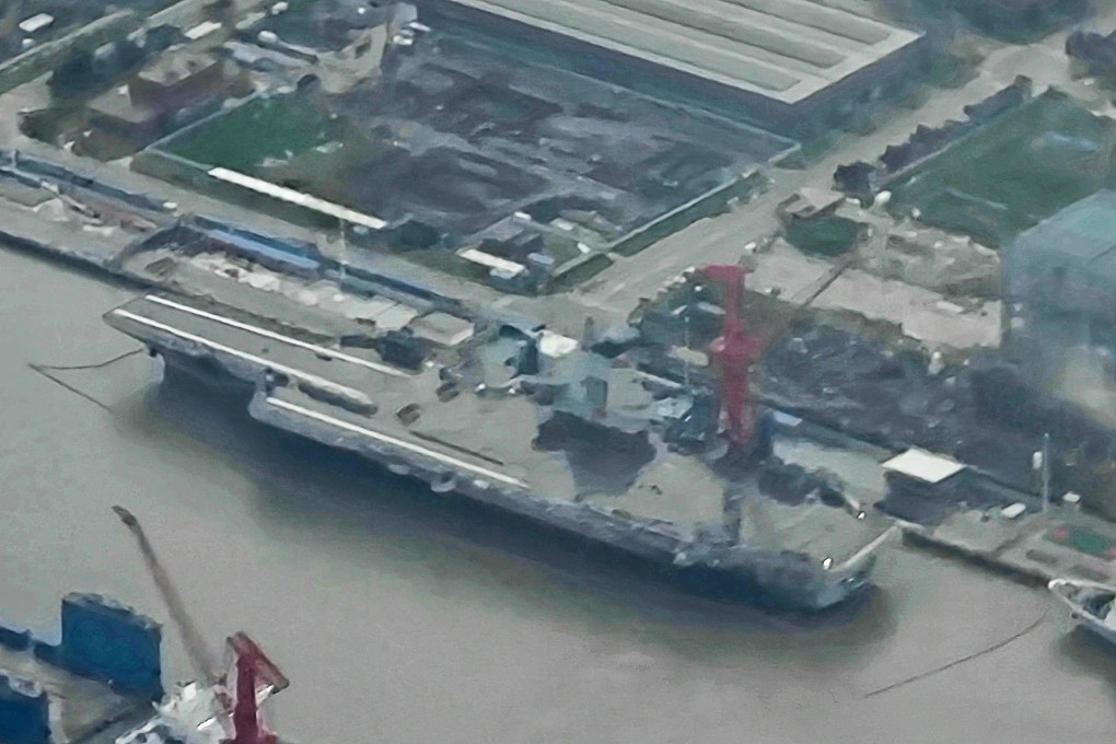 All covers appear to have been removed from  the three advanced electromagnetic catapults on the Fujian flight deck. Photo: Weibo