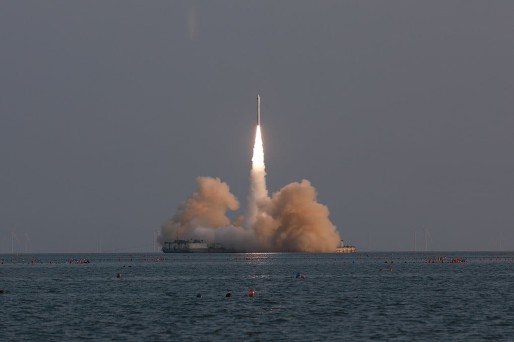 The commercial launch vehicle Ceres-1, carrying four satellites, blasts off from waters near Haiyang in Shandong province on Tuesday. Photo: EPA-EFE/Xinhua