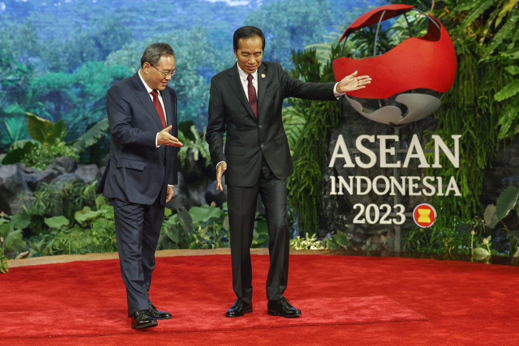 Chinese Premier Li Qiang (left) is greeted by Indonesian President Joko Widodo at the summit in Jakarta on Wednesday. Beijing is facing a backlash over its latest official map. Photo: AP
