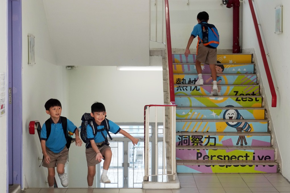 Students return school on the first day of school year in Tsuen Wan Trade Association Primary School in Tsing Yi. Photo: Sam Tsang